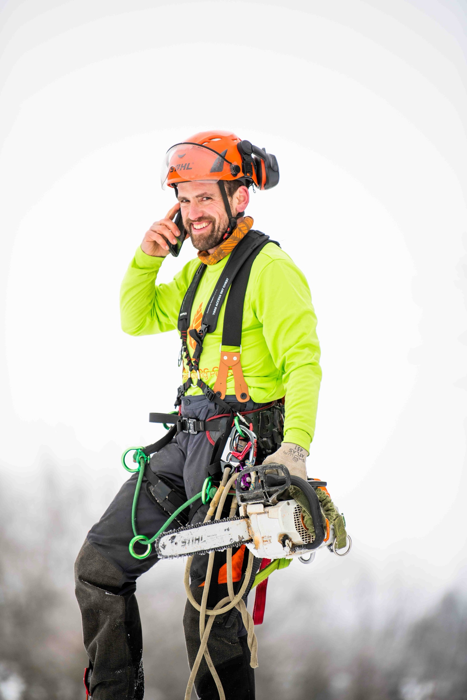 Tree Loving Care's owner talking through a tree question by phone